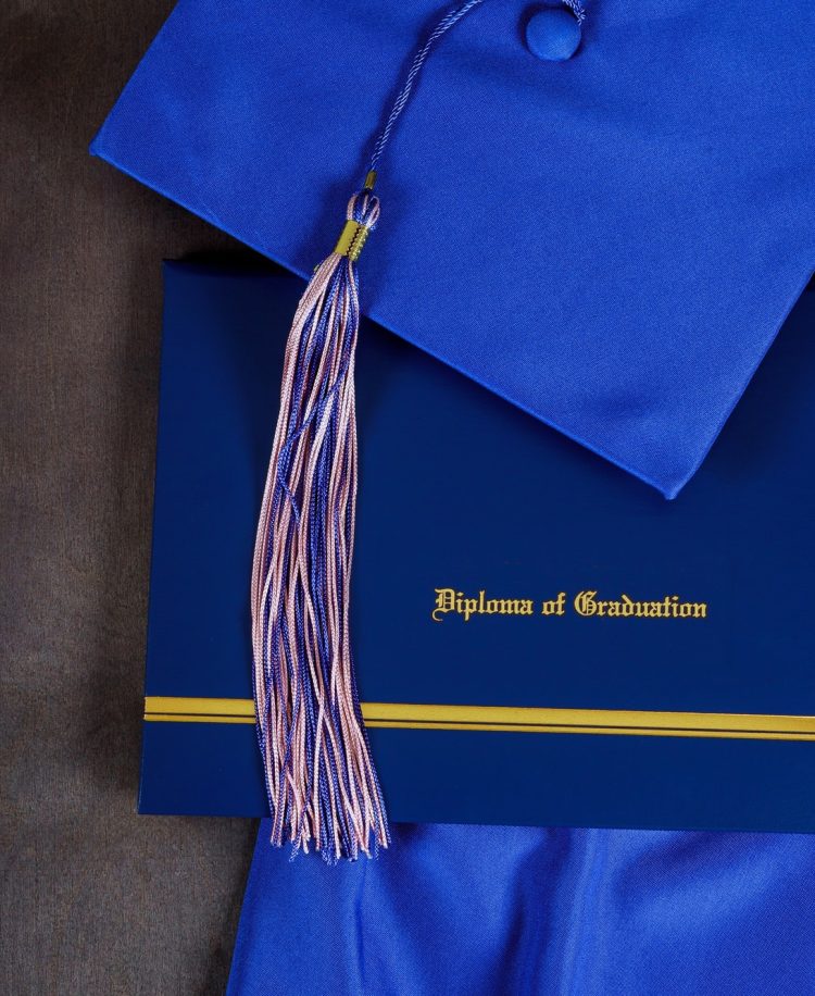 Graduation hat and diploma certificate front view graduate college concept